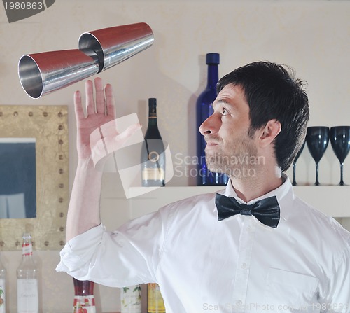 Image of pro barman prepare coctail drink on party