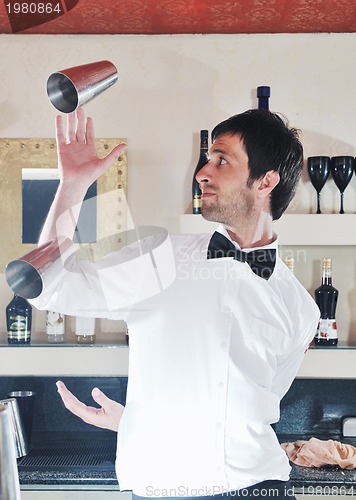 Image of pro barman prepare coctail drink on party