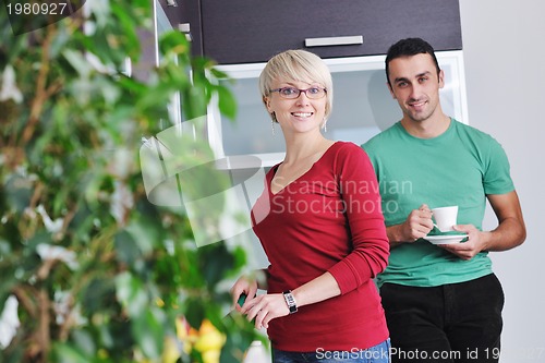 Image of young couple have fun in modern kitchen