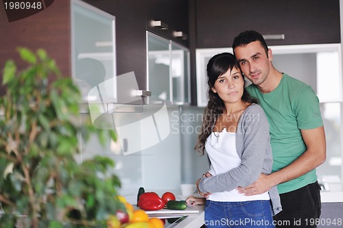 Image of young couple have fun in modern kitchen