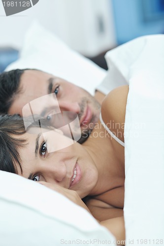 Image of young couple have good time in their bedroom