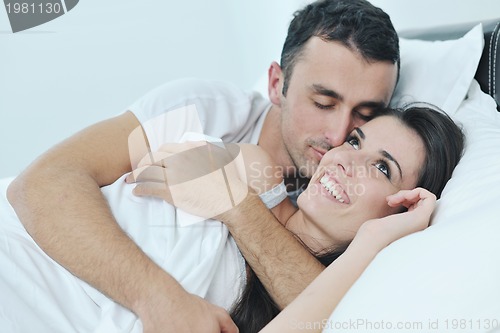 Image of young couple have good time in their bedroom