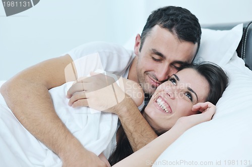 Image of young couple have good time in their bedroom