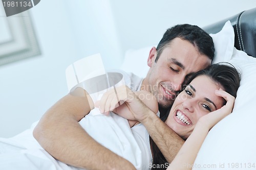 Image of young couple have good time in their bedroom