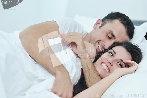 Image of young couple have good time in their bedroom