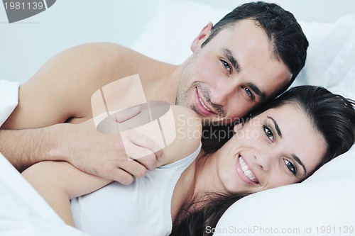 Image of young couple have good time in their bedroom