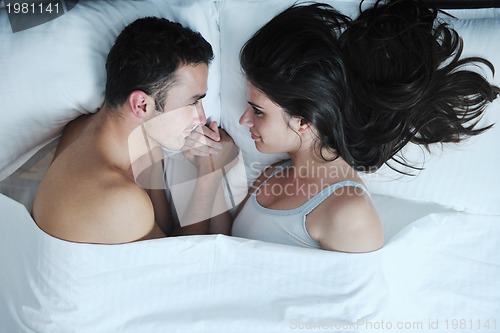 Image of young couple have good time in their bedroom