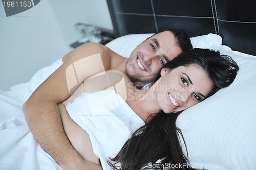 Image of young couple have good time in their bedroom