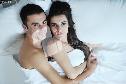 Image of young couple have good time in their bedroom