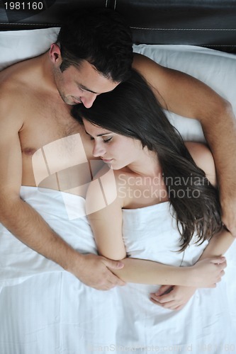 Image of young couple have good time in their bedroom