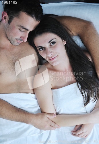 Image of young couple have good time in their bedroom