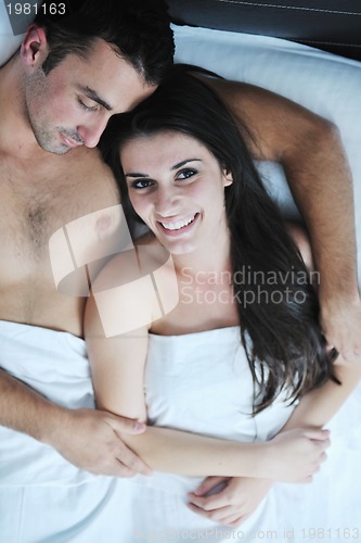 Image of young couple have good time in their bedroom