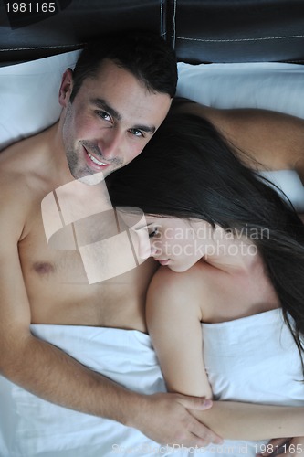 Image of young couple have good time in their bedroom