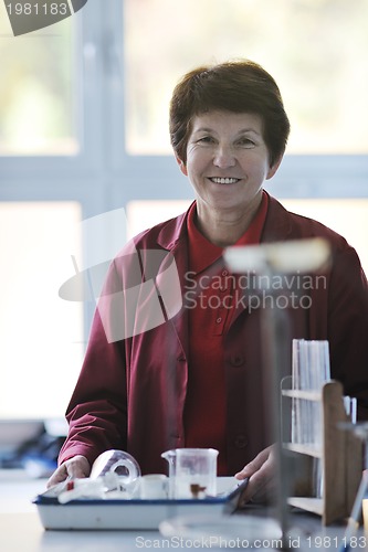 Image of science and chemistry teacher portrait in classroom