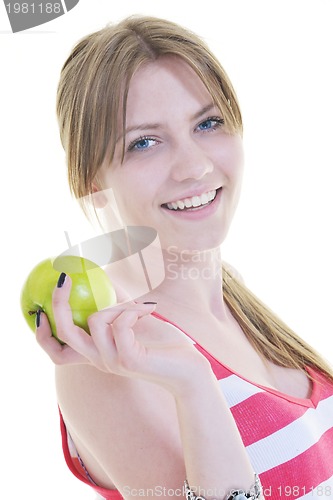 Image of happy  young  woman eat green apple isolated  on white