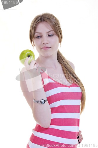 Image of happy  young  woman eat green apple isolated  on white