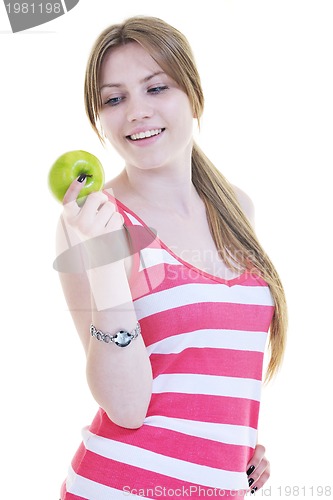 Image of happy  young  woman eat green apple isolated  on white