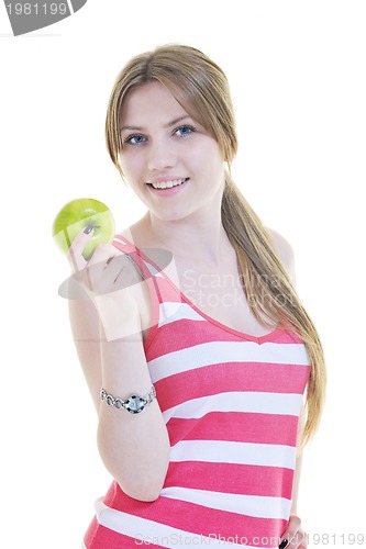 Image of happy  young  woman eat green apple isolated  on white