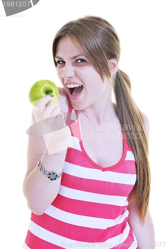 Image of happy  young  woman eat green apple isolated  on white