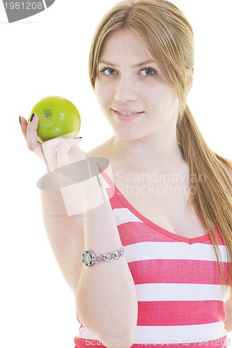 Image of happy  young  woman eat green apple isolated  on white