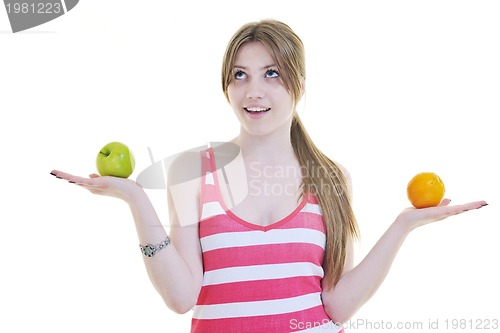 Image of happy  young  woman eat apple isolated  on white