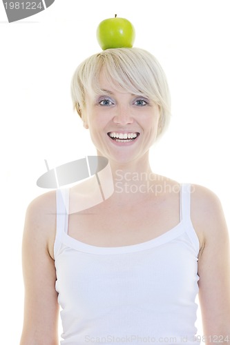 Image of happy  young  woman eat green apple isolated  on white