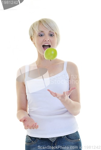 Image of happy  young  woman eat green apple isolated  on white