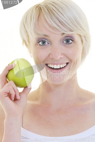 Image of happy  young  woman eat green apple isolated  on white