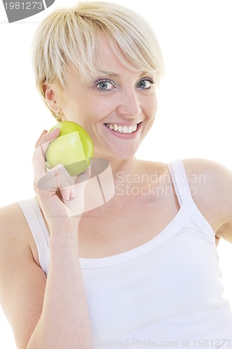 Image of happy  young  woman eat green apple isolated  on white