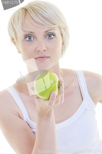 Image of happy  young  woman eat green apple isolated  on white
