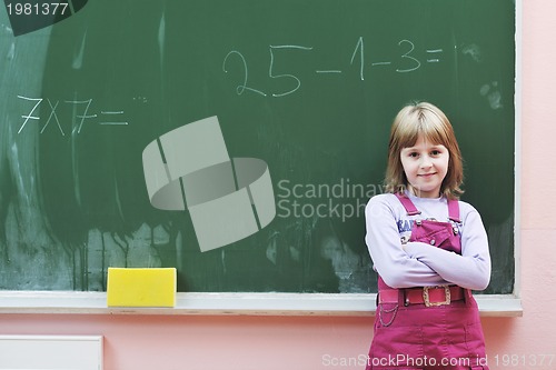 Image of happy school girl on math classes