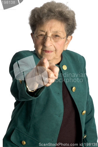 Image of senior woman  serious pointing