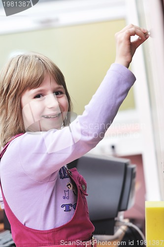 Image of happy school girl on math classes