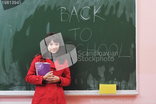 Image of happy school girl on math classes