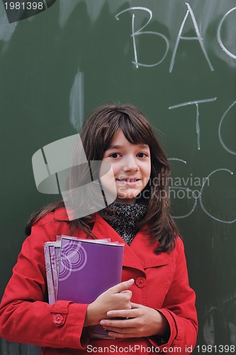 Image of happy school girl on math classes