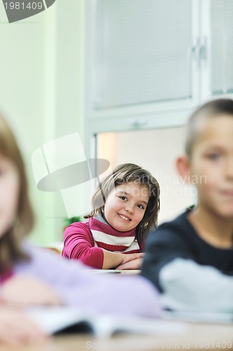 Image of happy child  in schoold have fun and learning leassos