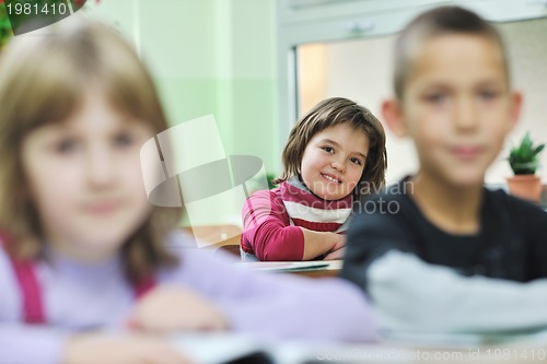 Image of happy child  in schoold have fun and learning leassos