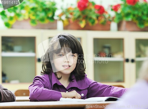 Image of happy child  in schoold have fun and learning leassos