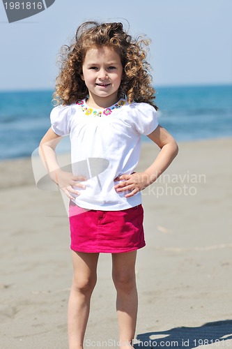 Image of little female  child portrait on the beach