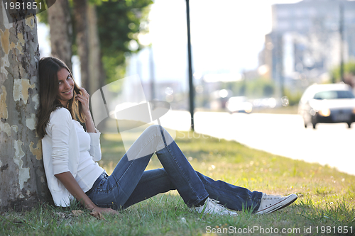 Image of young woman havefun at street 