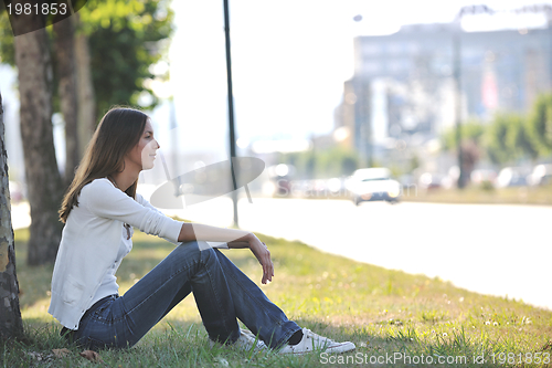 Image of young woman havefun at street 