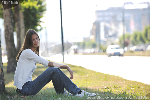 Image of young woman havefun at street 