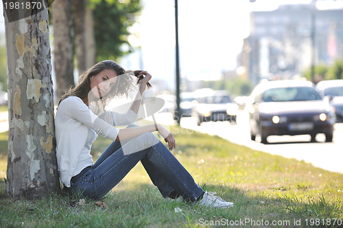 Image of young woman havefun at street 