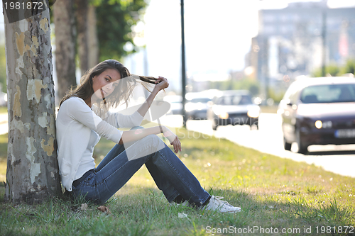 Image of young woman havefun at street 