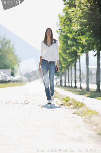 Image of young woman havefun at street 