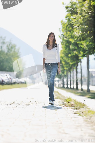 Image of young woman havefun at street 