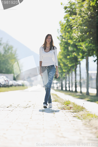 Image of young woman havefun at street 