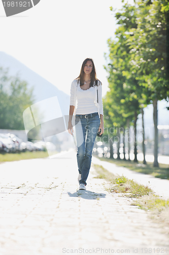 Image of young woman havefun at street 