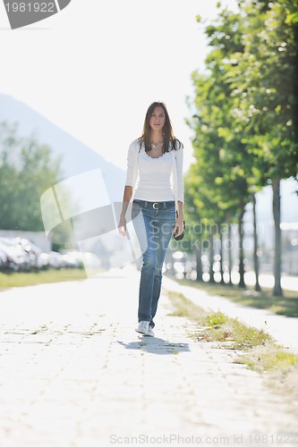 Image of young woman havefun at street 