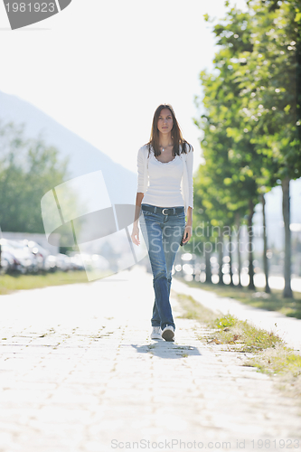 Image of young woman havefun at street 